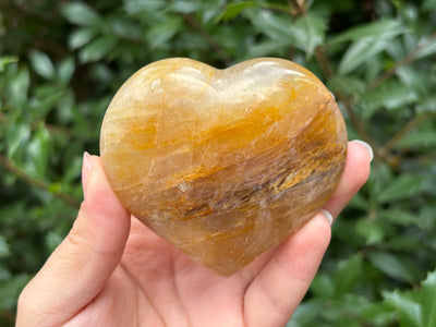 Natural Golden Healer Quartz heart-shaped polished gemstone, ideal for meditation, energy balance and decorative use - RSH317